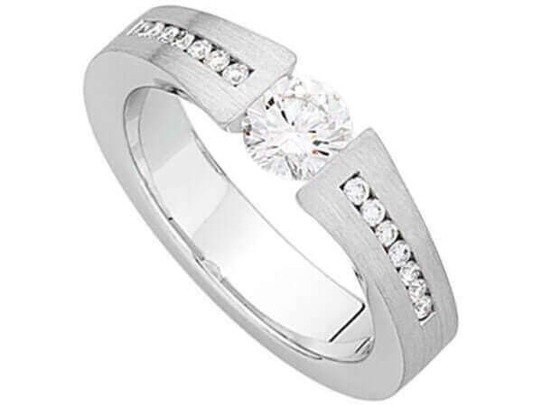 A White Gold Tension Set Round Diamond With Tapered Diamonds Band C910 engagement ring with a round diamond in the center.