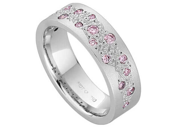 A Random Set Dress Ring With Pink Diamonds C915 set with pink sapphires.