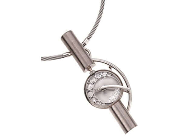 A silver pendant with a diamond on it, adorned with the rEvolution2 -2008 Award Finalist -C4031 design.