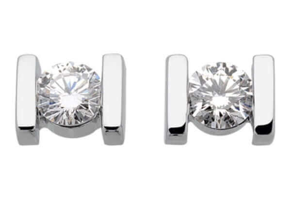 A pair of White Gold Bar Set Diamond Earrings C614 with cubic zirconia and bar set.