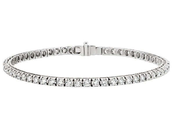 A sparkling claw set diamond tennis bracelet C926 complemented by white gold.