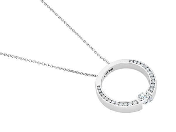 A white gold circle pendant with a diamond in the center.