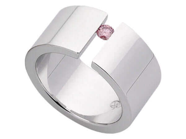 A white gold Pink Diamond Tension Set Ring C665 with a pink sapphire.