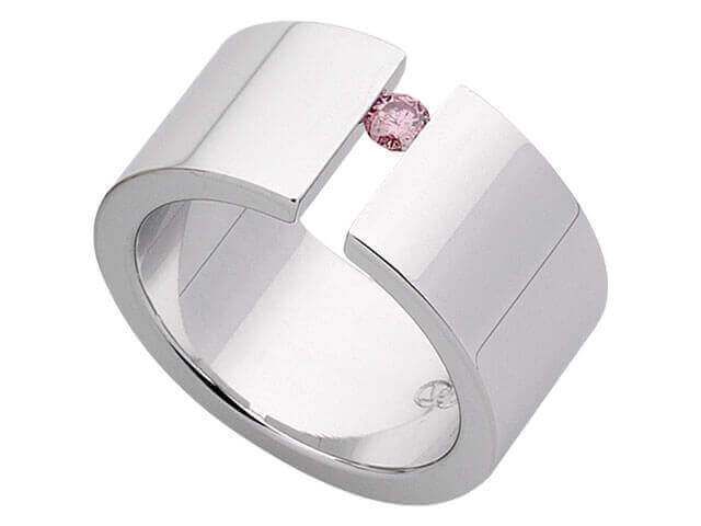 A white gold Pink Diamond Tension Set Ring C665 with a pink sapphire.