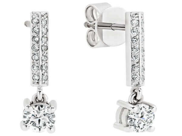 A stunning pair of 4 claw diamond drop earrings C635 in elegant white gold.