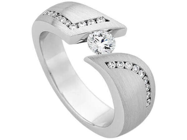 A White Gold Tension Set Round Diamond Ring With Channel Set Diamonds Band C741 with a round diamond set in the center.