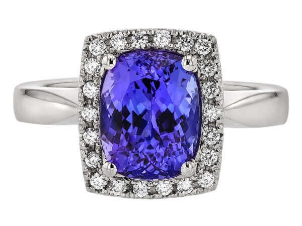 A close up of a Blue Tanzanite and Diamond Halo Engagement Ring C1067.