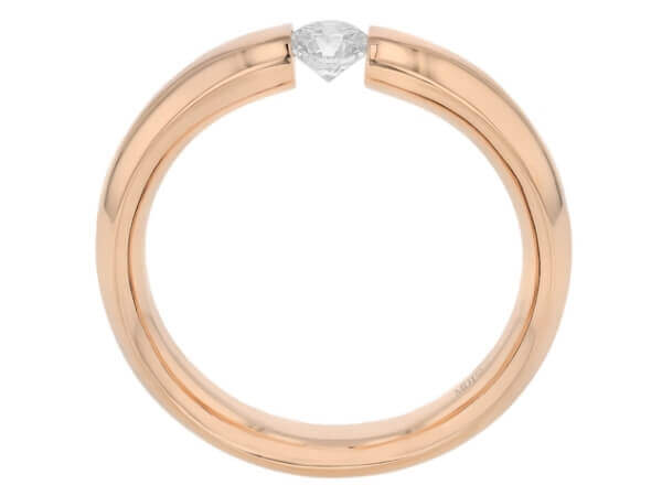 A polished rose gold ring with a Diamond Tension Set with Rounded Band and Polished Finish C015 in the center.