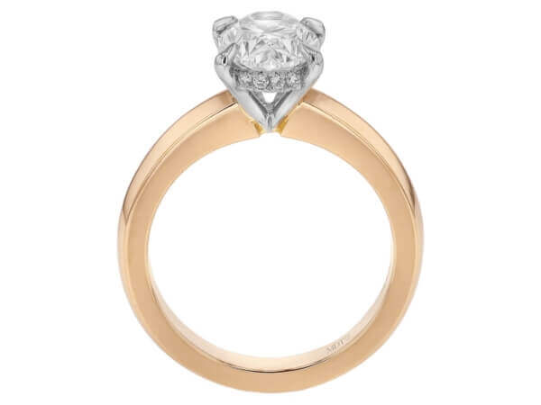 A Oval Diamond Engagement Ring with Diamond Hidden Halo C560 featuring an oval diamond set in a beautiful combination of rose gold and white gold.