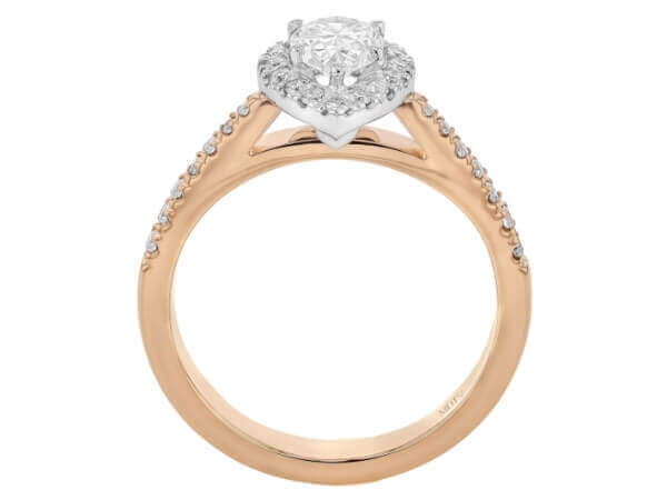 A dazzling Pear Shape Diamond Halo Engagement Ring in 18ct Rose Gold C1058, adorned with a delicate diamond halo.