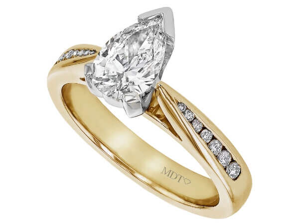 A Pear Diamond Engagement Ring with Channel set Diamond Band C673 in yellow gold, featuring a channel set diamond band.