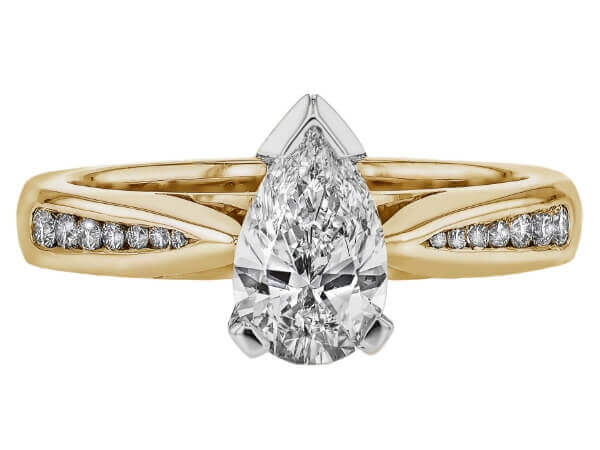 An Pear Diamond Engagement Ring with Channel set Diamond Band C673 with a white background.