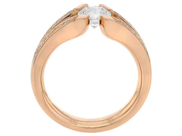 A Split Band Diamond Tension Set Ring C1042 rose gold engagement ring with an oval cut diamond.